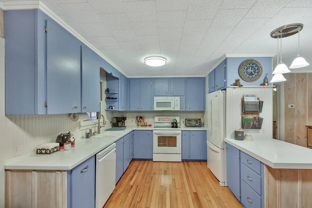 197 Jubie Ln, Seneca, SC 29672 - kitchen featuring white appliances, blue cabinetry, ornamental molding, open shelves, and a peninsula