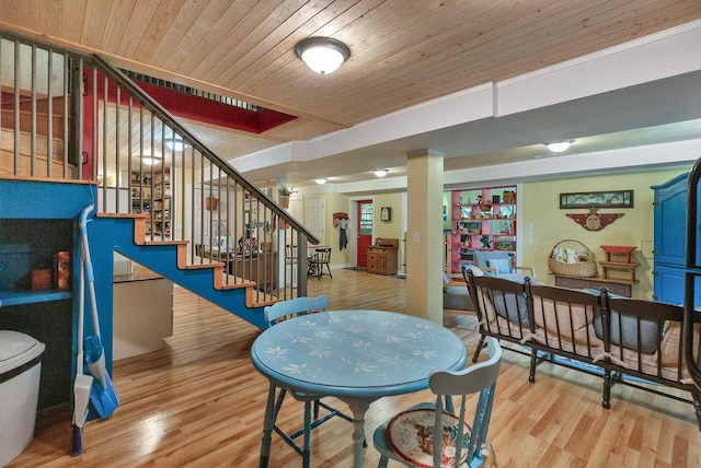 197 Jubie Ln, Seneca, SC 29672 - dining area featuring stairway, wood ceiling, and light wood-type flooring