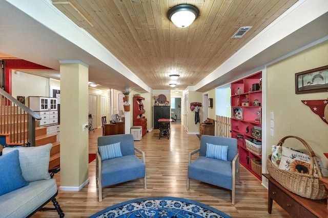 197 Jubie Ln, Seneca, SC 29672 - living area with wood finished floors, wooden ceiling, stairs, and built in shelves