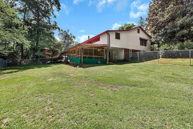 197 Jubie Ln, Seneca, SC 29672 - back of house with a sunroom and a fenced backyard