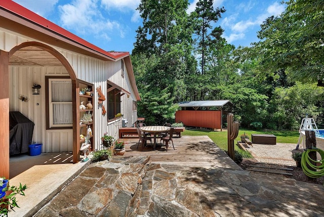 197 Jubie Ln, Seneca, SC 29672 - view of patio featuring outdoor dining area and a storage unit