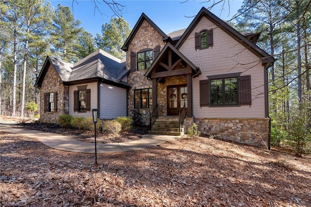 703 Timberbrook Trl, Salem, SC 29676 - view of front of home with stone siding, french doors, and roof with shingles