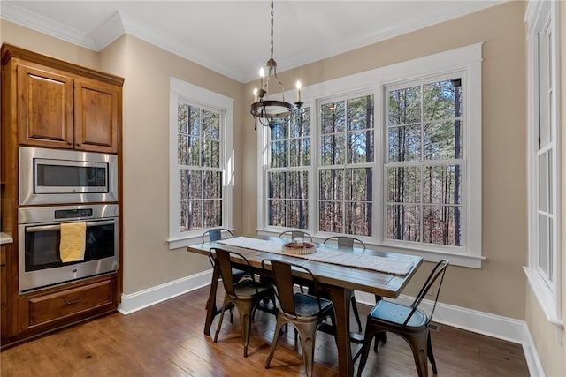 703 Timberbrook Trl, Salem, SC 29676 - dining area with a chandelier, crown molding, dark wood-type flooring, and plenty of natural light