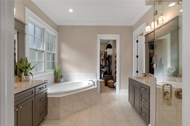 703 Timberbrook Trl, Salem, SC 29676 - bathroom with vanity, a spacious closet, a garden tub, ornamental molding, and a shower stall