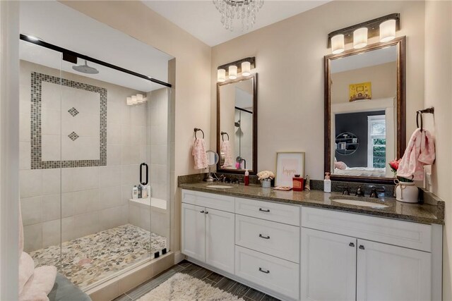703 Timberbrook Trl, Salem, SC 29676 - ensuite bathroom featuring a stall shower, double vanity, and a chandelier