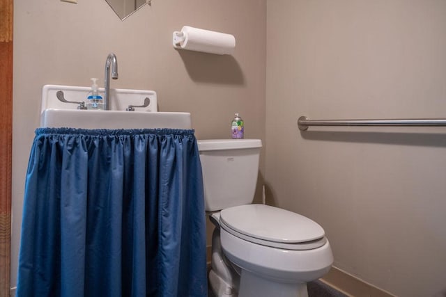 316 Brewer Rd, Walhalla, SC 29691 - bathroom featuring toilet and baseboards