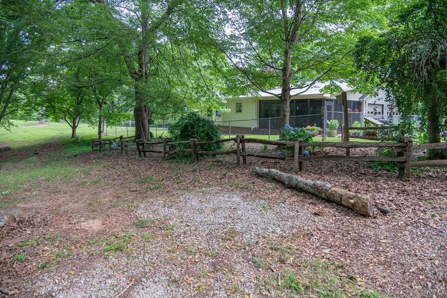 316 Brewer Rd, Walhalla, SC 29691 - fenced yard featuring a sunroom
