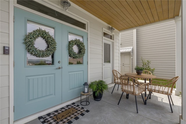 914 Blue Moon St, Taylors, SC 29687 - entrance to property featuring french doors, a porch, and outdoor dining space