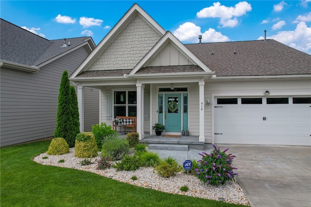 914 Blue Moon St, Taylors, SC 29687 - craftsman inspired home with a porch, driveway, an attached garage, a shingled roof, and board and batten siding
