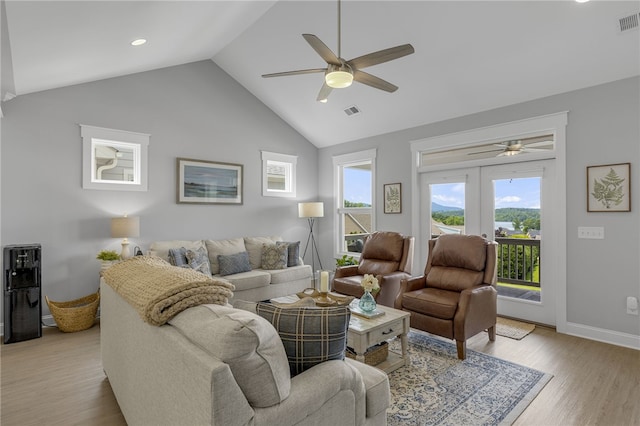 914 Blue Moon St, Taylors, SC 29687 - living room featuring a ceiling fan, light wood-type flooring, lofted ceiling, plenty of natural light, and recessed lighting