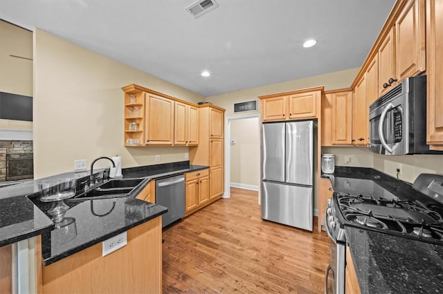 213 Redbud St, Seneca, SC 29672 - kitchen featuring stainless steel appliances, open shelves, light brown cabinets, a peninsula, and light wood-style flooring