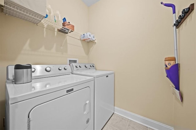 213 Redbud St, Seneca, SC 29672 - laundry area featuring separate washer and dryer and light tile patterned flooring