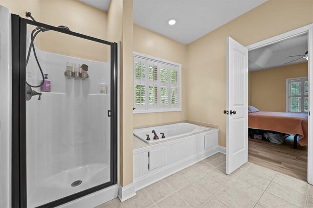 213 Redbud St, Seneca, SC 29672 - bathroom with a shower stall, tile patterned floors, connected bathroom, and a bath