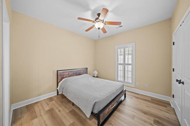 213 Redbud St, Seneca, SC 29672 - bedroom featuring wood finished floors, a closet, and ceiling fan