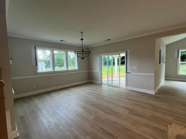 109 Sunrise Ct Unit Sun0005, Anderson, SC 29625 - unfurnished dining area with a chandelier, crown molding, healthy amount of natural light, and wood finished floors