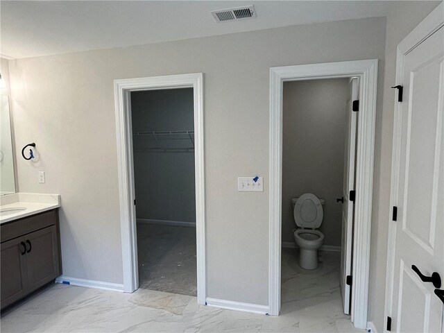 109 Sunrise Ct Unit Sun0005, Anderson, SC 29625 - bathroom featuring marble finish flooring, vanity, and a walk in closet