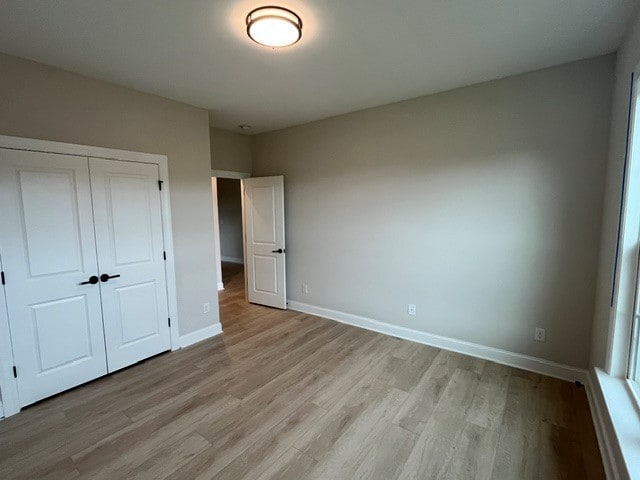 109 Sunrise Ct Unit Sun0005, Anderson, SC 29625 - unfurnished bedroom featuring light wood finished floors and a closet