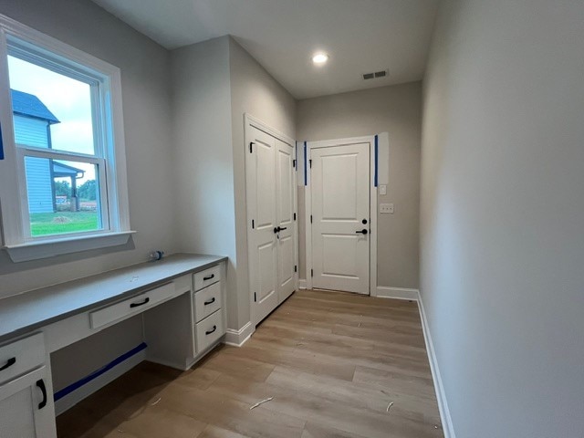 109 Sunrise Ct Unit Sun0005, Anderson, SC 29625 - hallway featuring light wood-style floors, an office area, and recessed lighting