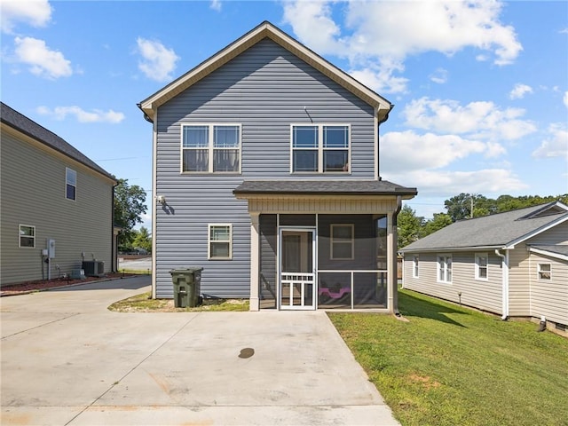 112 Wilbur St, Easley, SC 29640 - rear view of property featuring a sunroom and a lawn
