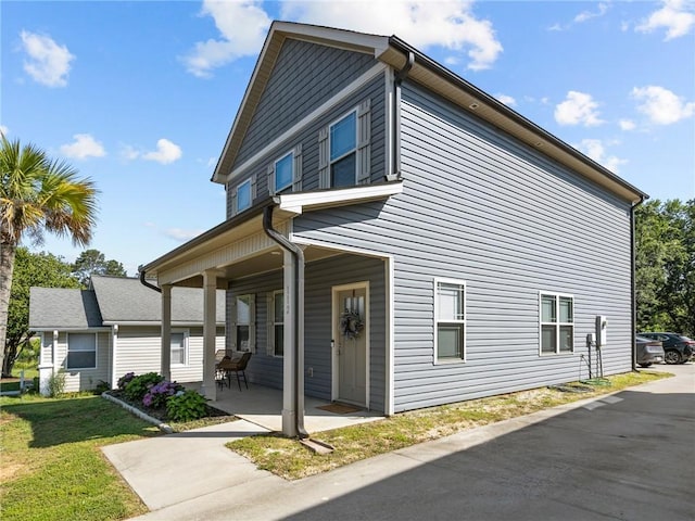 112 Wilbur St, Easley, SC 29640 - view of home's exterior featuring a porch and a yard