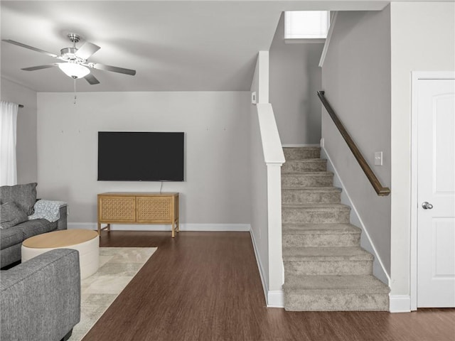 112 Wilbur St, Easley, SC 29640 - living room featuring wood finished floors, a ceiling fan, and stairs