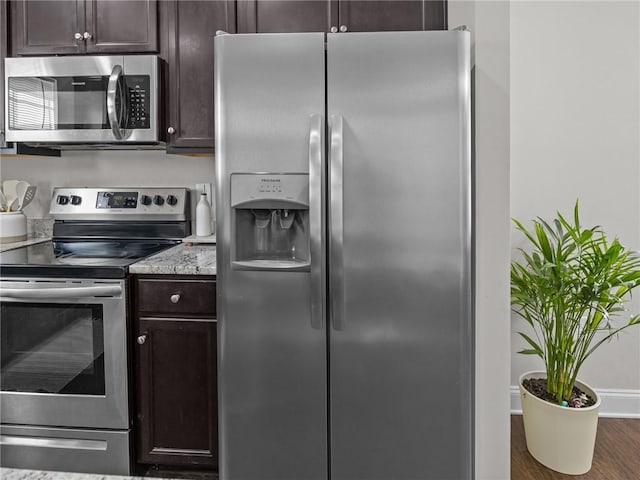 112 Wilbur St, Easley, SC 29640 - kitchen with stainless steel appliances, dark brown cabinets, and wood finished floors