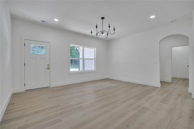 110 Dalton Rd, Seneca, SC 29678 - entryway with arched walkways, light wood finished floors, recessed lighting, and a chandelier