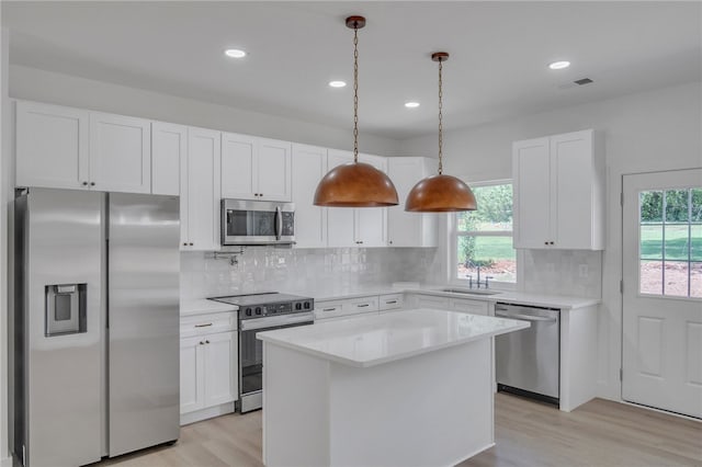 110 Dalton Rd, Seneca, SC 29678 - kitchen with stainless steel appliances, light wood finished floors, plenty of natural light, light countertops, and recessed lighting