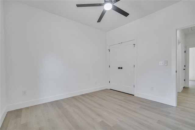 110 Dalton Rd, Seneca, SC 29678 - unfurnished bedroom featuring light wood-style floors, attic access, a closet, and a ceiling fan