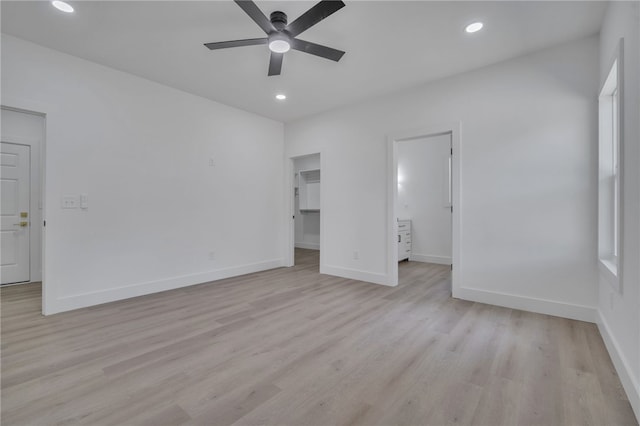110 Dalton Rd, Seneca, SC 29678 - unfurnished bedroom featuring a walk in closet, light wood-style floors, recessed lighting, a ceiling fan, and connected bathroom