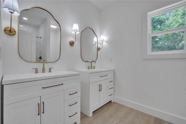 110 Dalton Rd, Seneca, SC 29678 - full bath with two vanities, wood finished floors, and a shower