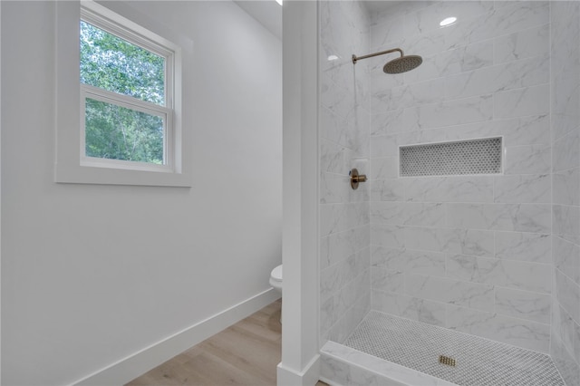110 Dalton Rd, Seneca, SC 29678 - bathroom featuring tiled shower and wood finished floors