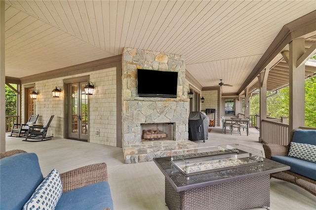 129 N Lawn Dr, Sunset, SC 29685 - view of patio featuring an outdoor living space with a fireplace, a ceiling fan, french doors, and a grill