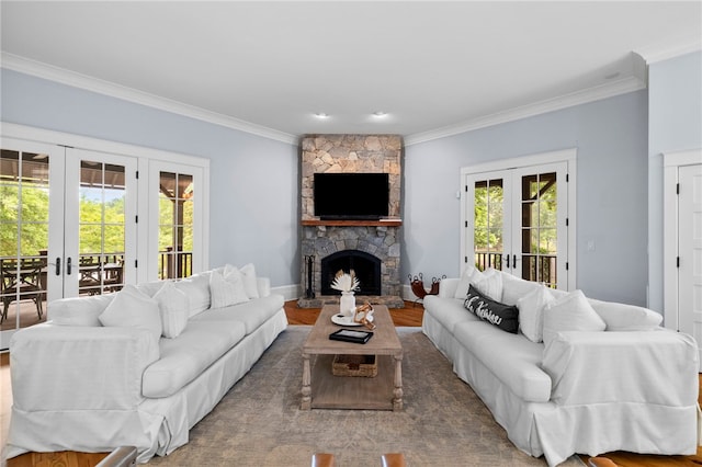 129 N Lawn Dr, Sunset, SC 29685 - living area featuring french doors, crown molding, wood finished floors, and a stone fireplace