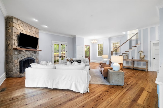 129 N Lawn Dr, Sunset, SC 29685 - living area with stairs, crown molding, a chandelier, and light wood finished floors