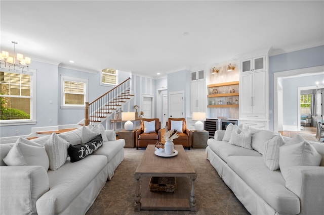 129 N Lawn Dr, Sunset, SC 29685 - living room with a chandelier, crown molding, stairs, a bar, and wine cooler