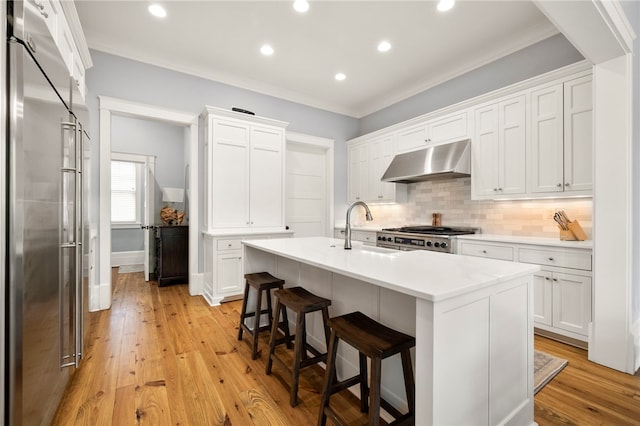 129 N Lawn Dr, Sunset, SC 29685 - kitchen featuring under cabinet range hood, high quality fridge, range, light countertops, and recessed lighting