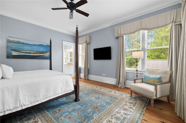 129 N Lawn Dr, Sunset, SC 29685 - bedroom with wood finished floors, ceiling fan, and ornamental molding