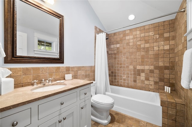 129 N Lawn Dr, Sunset, SC 29685 - bathroom with vanity, shower / bath combo with shower curtain, tile walls, and vaulted ceiling
