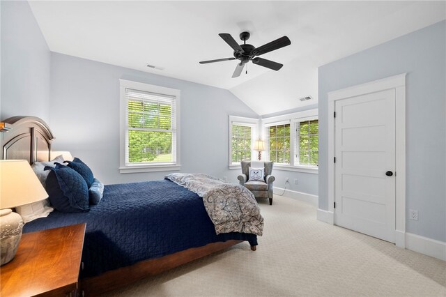 129 N Lawn Dr, Sunset, SC 29685 - carpeted bedroom with multiple windows, lofted ceiling, and a ceiling fan
