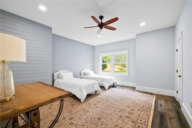 129 N Lawn Dr, Sunset, SC 29685 - bedroom with wood finished floors, recessed lighting, wooden walls, and ceiling fan