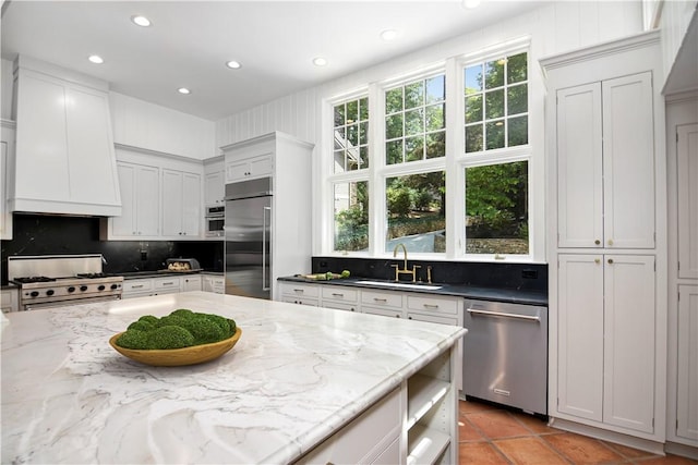 6 Skipper Ln, Salem, SC 29676 - kitchen featuring high end appliances, plenty of natural light, recessed lighting, tasteful backsplash, and custom range hood