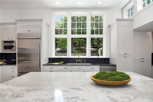 6 Skipper Ln, Salem, SC 29676 - kitchen with appliances with stainless steel finishes, light stone countertops, white cabinetry, and recessed lighting