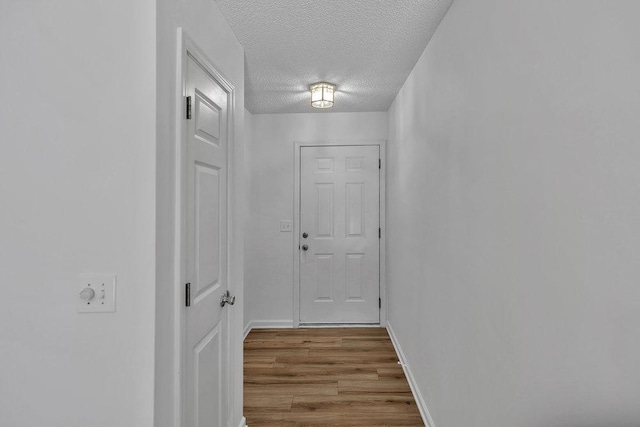 433 Den Ridge Dr, Walhalla, SC 29691 - corridor featuring a textured ceiling and wood finished floors