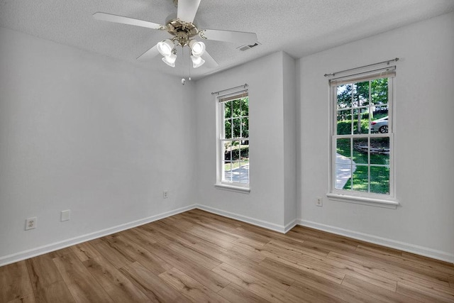 433 Den Ridge Dr, Walhalla, SC 29691 - spare room featuring wood finished floors, a textured ceiling, and ceiling fan