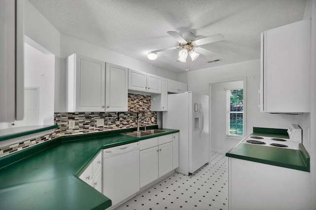 433 Den Ridge Dr, Walhalla, SC 29691 - kitchen with white appliances, light flooring, white cabinetry, ceiling fan, and a textured ceiling