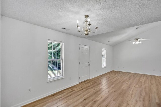 433 Den Ridge Dr, Walhalla, SC 29691 - entryway with a chandelier, healthy amount of natural light, light wood-type flooring, a textured ceiling, and ceiling fan