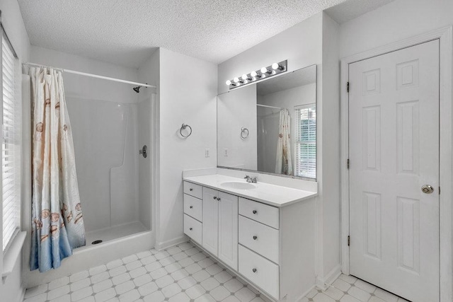 433 Den Ridge Dr, Walhalla, SC 29691 - bathroom with a shower with shower curtain, vanity, a textured ceiling, and tile patterned floors