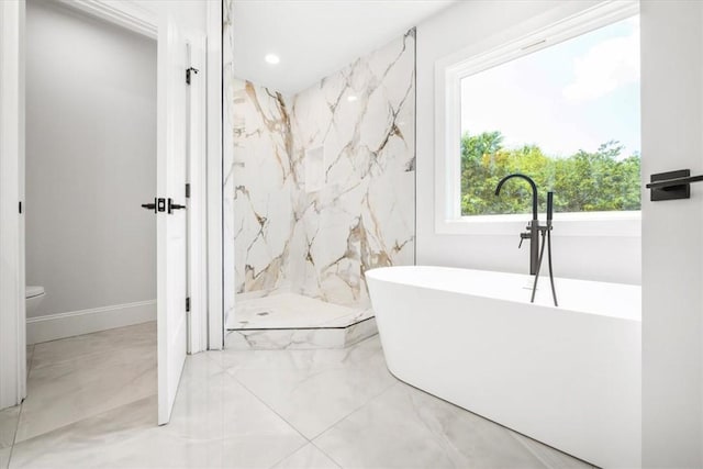 123 Moore Dr, Easley, SC 29642 - full bathroom with a soaking tub, a marble finish shower, and marble finish flooring