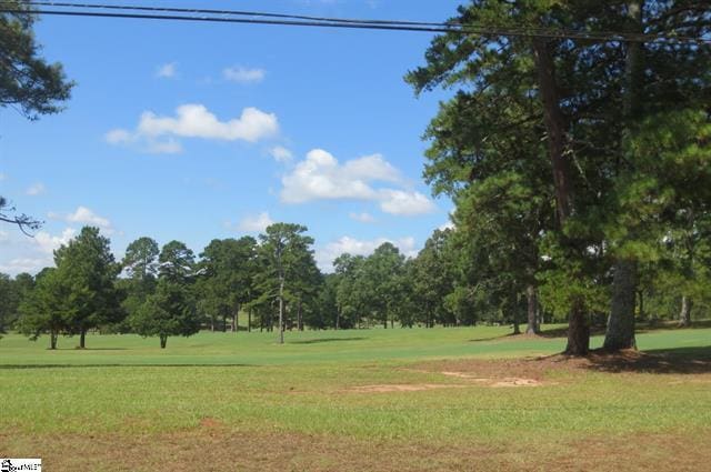 118 Lakeside Dr, Anderson, SC 29621 - view of community featuring a lawn and view of wooded area